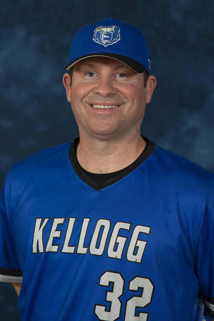 Head coach Marcus Reed in academy cap