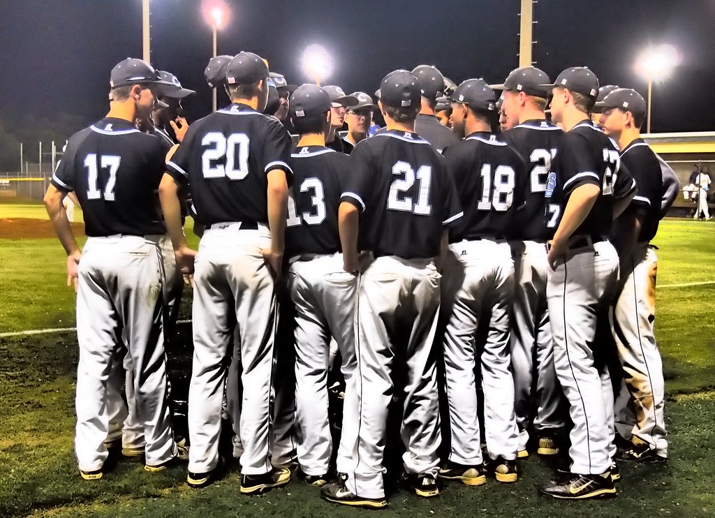 Team huddling before a tournament game
