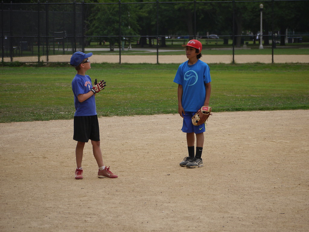 Kids practicing on the field during a group class